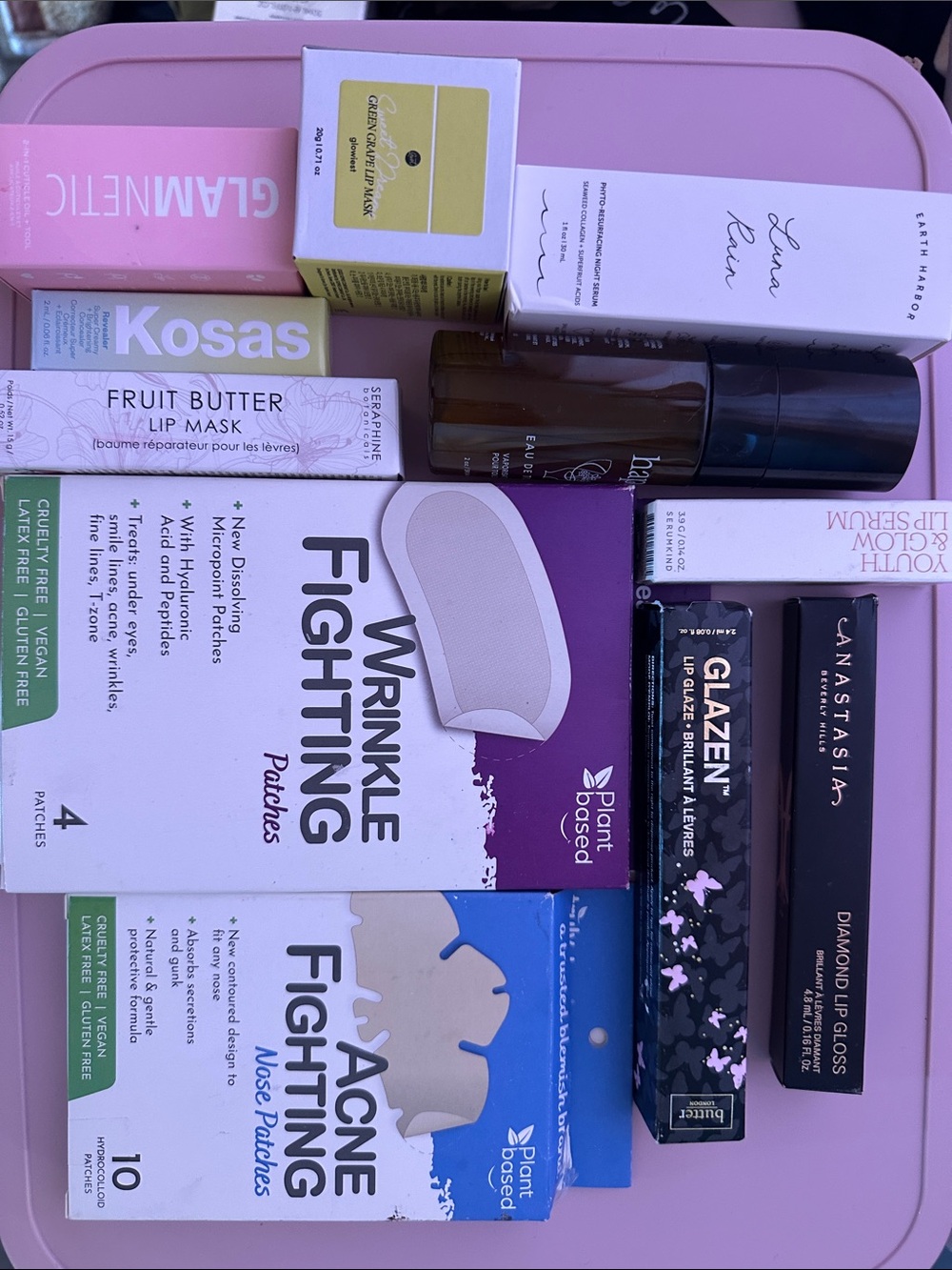 11 piece luxury skincare & beauty lot — all brand new/unopened.